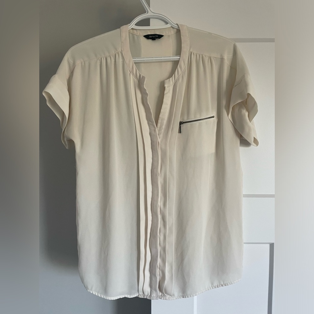 Ivory sheer shirt with zipper pocket and double pleat on the back